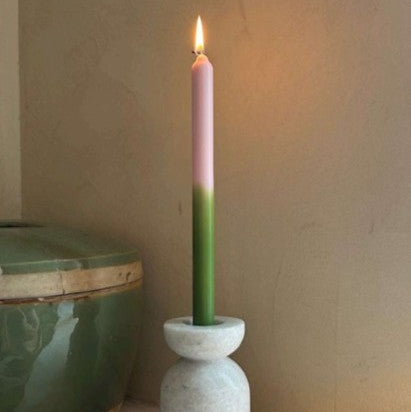 Pigmalion London Set of 2 Dinner Candles in Green with a Pale Pink Tip packaged in a white box with 2 windows showing the colour of the candles.