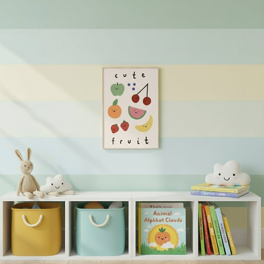 Framed artwork with cartoon fruits and 'cute fruit' text on a light pink background