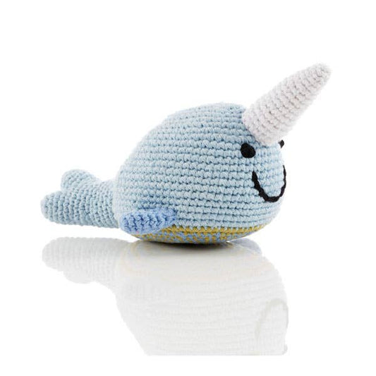 Narwhal crochet baby rattle displayed on white background.