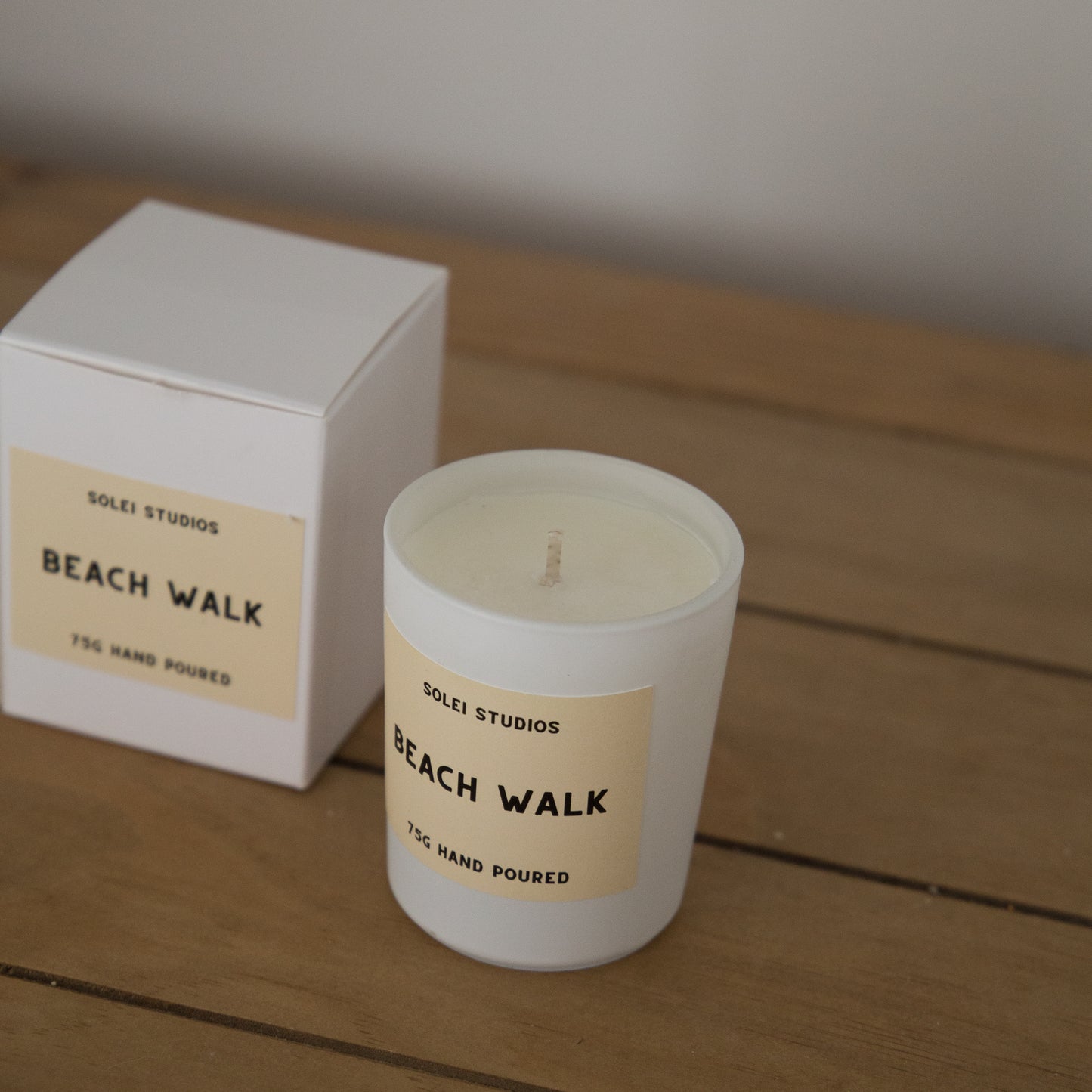 Solei Studios Mini Jar Candle Beach inspired front shot of packaging and candle displayed next to its box