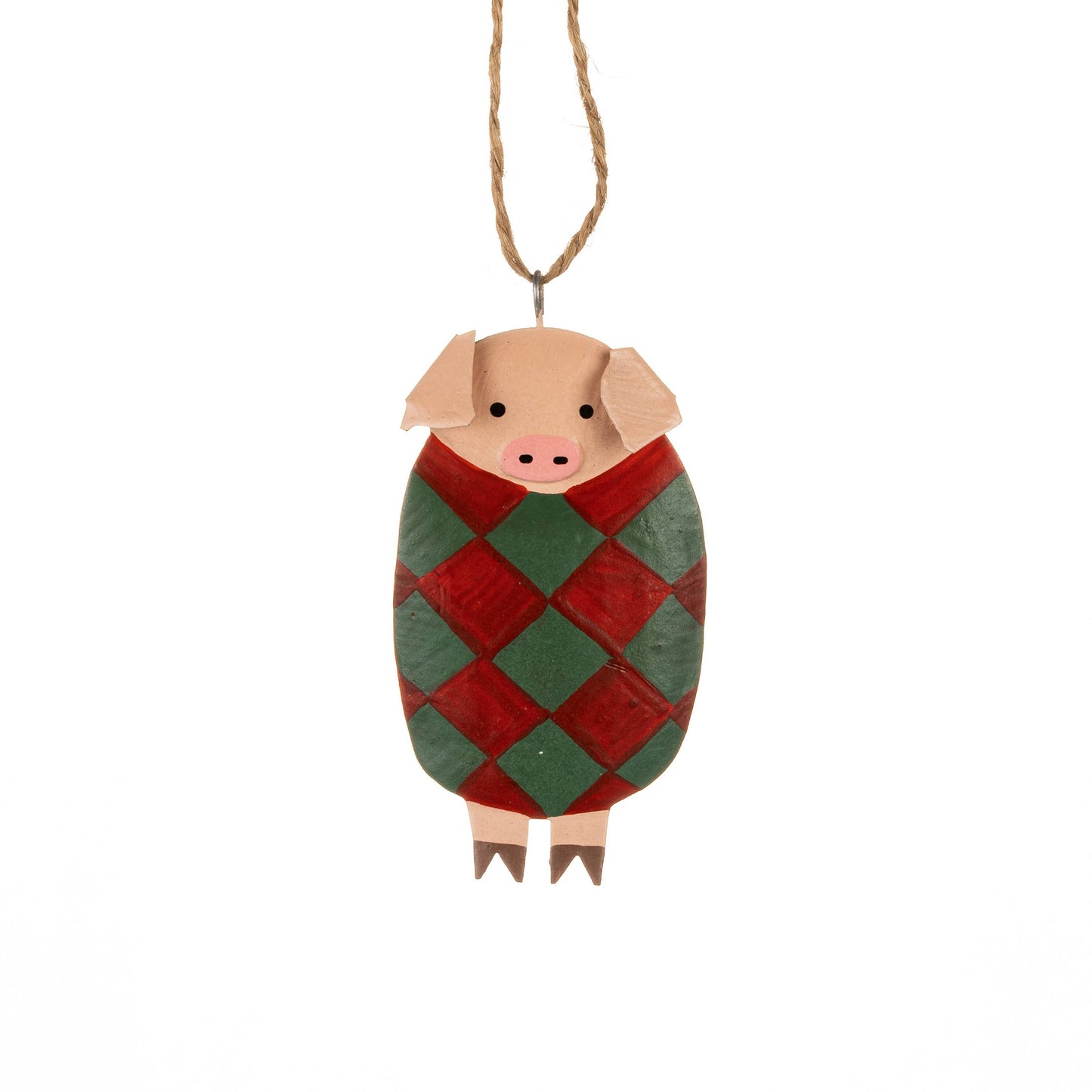 Decorative pig ornament with green and red pattern on a white background