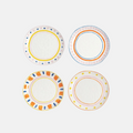 Four decorative plates with colorful rim designs on a white background