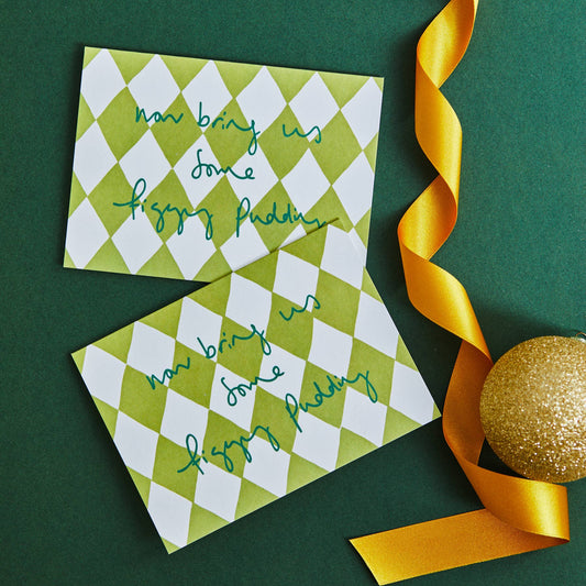 Green and white checkered card with text and a yellow ribbon on a green background