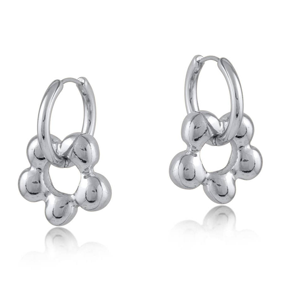 Pair of silver hoop earrings on a white background