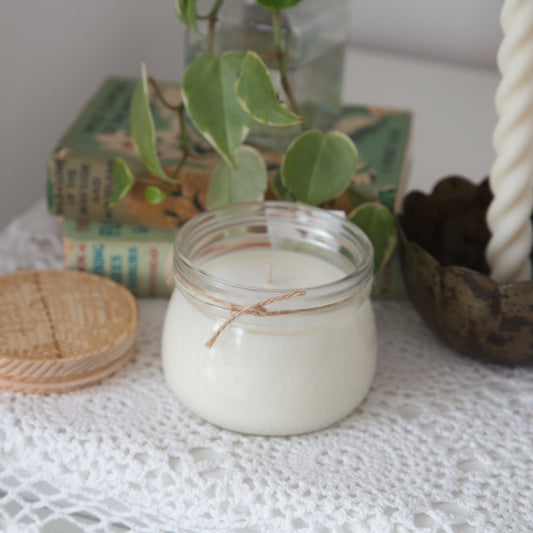 Styled shot of Agnes and car Small Kilner Jar Candle with lid off 