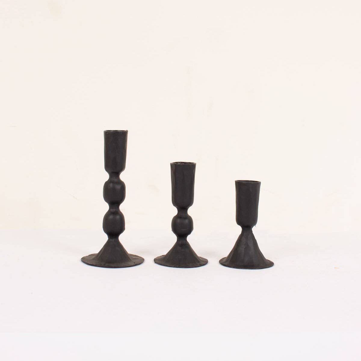 Group shot of 100% Iron Black Candle Holders available in three sizes