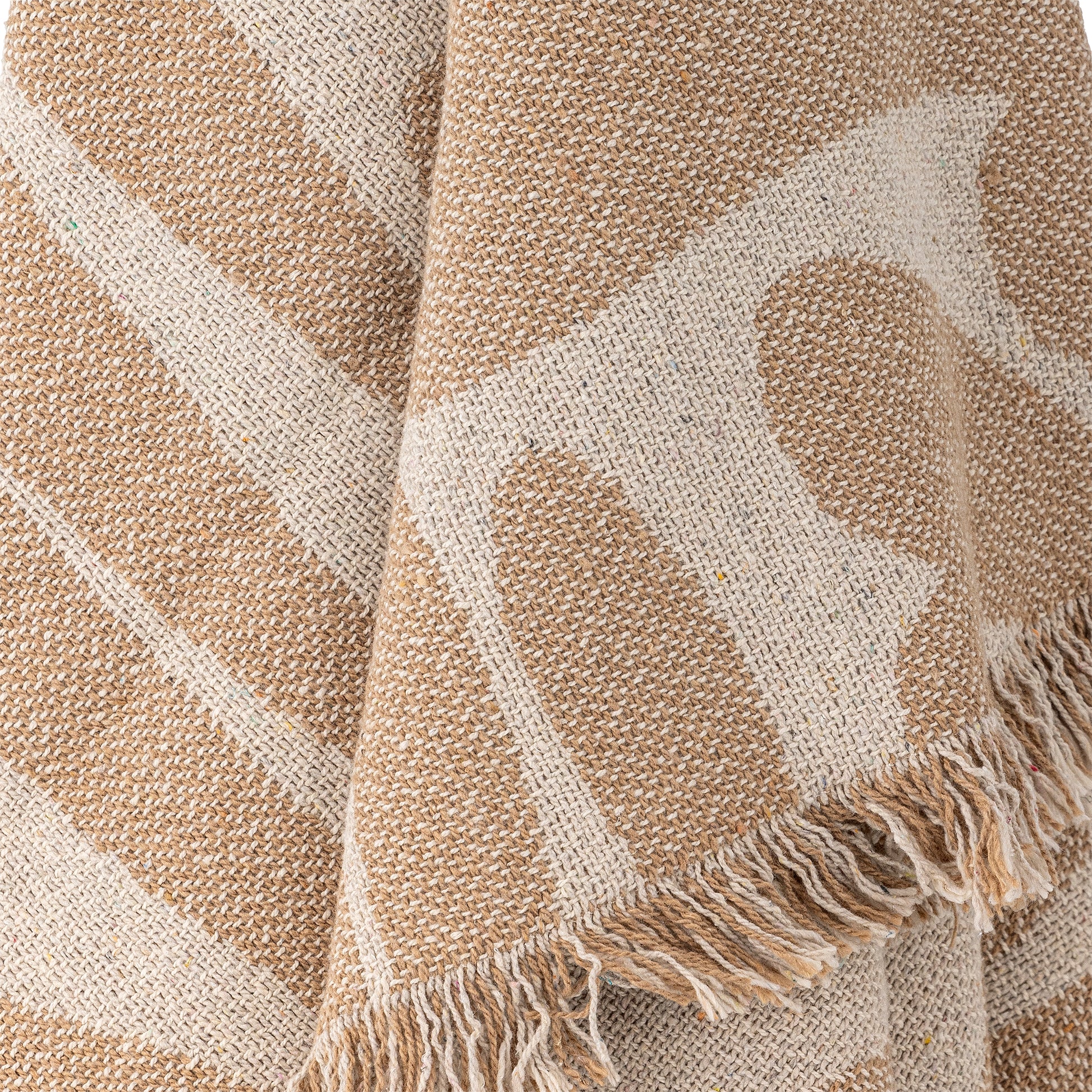 Soft brown patterned throw made from recycled cotton close up 