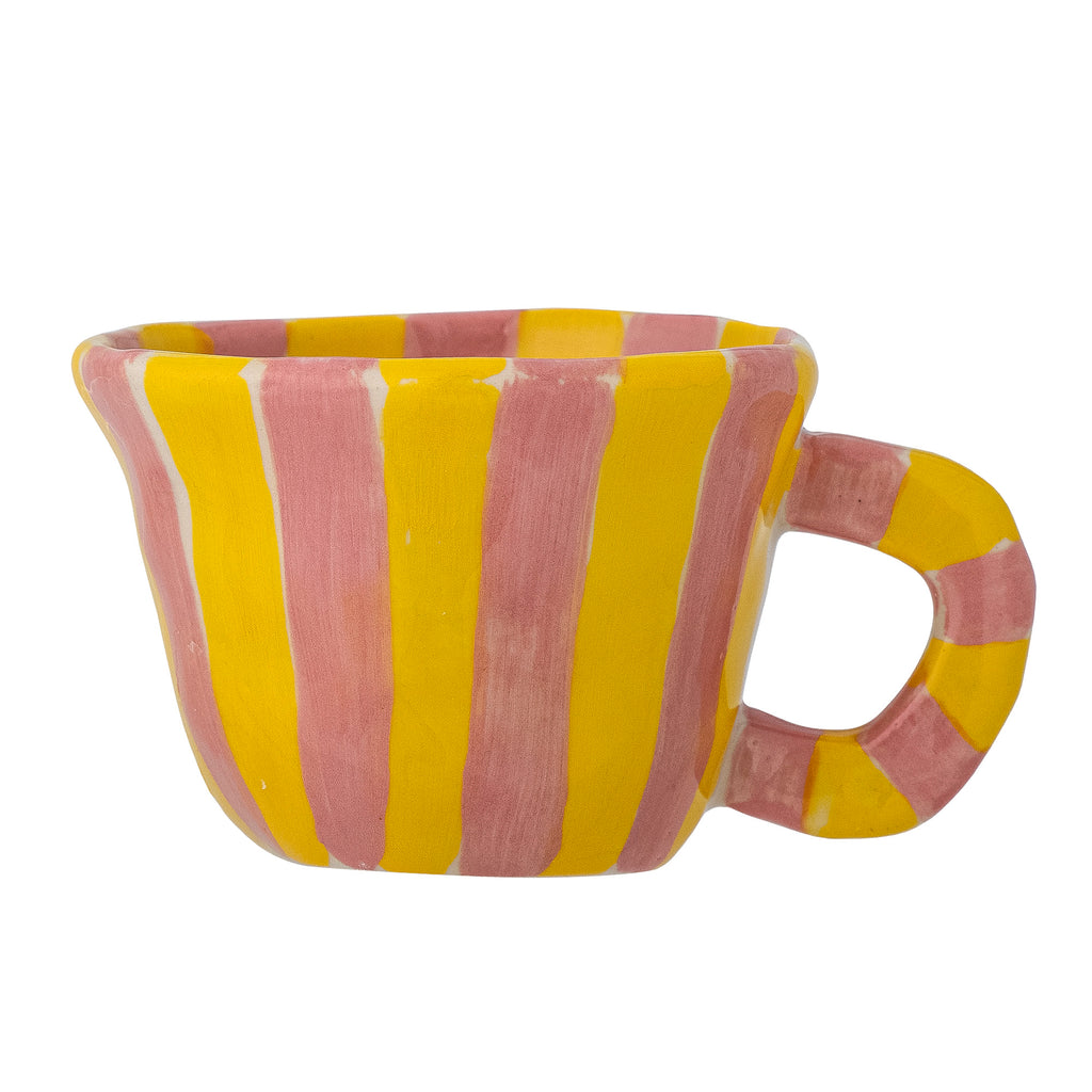 Bloomingville Nini Cup in Pink and Yellow Stripe up against a white background.