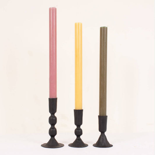 Group shot displaying candles in 100% iron black candle holders three different sizes