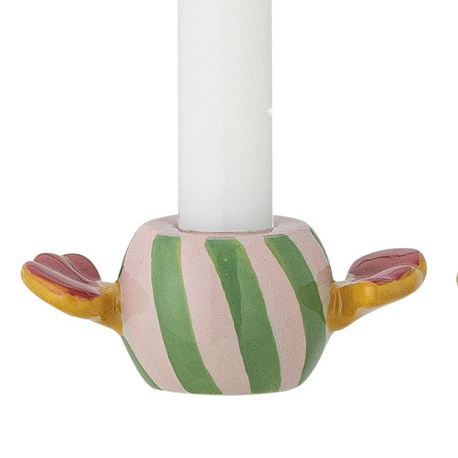 Candle holder with striped design on a white background
