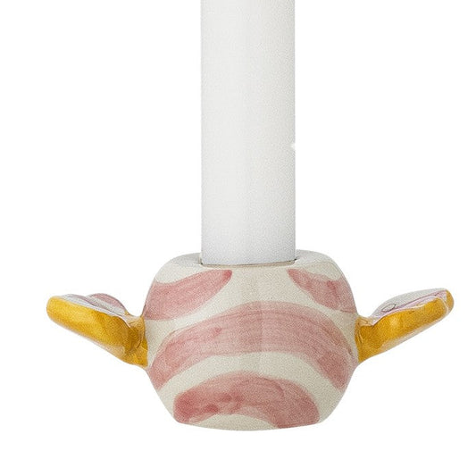 Candle holder with pink and white marble design and gold accents on a white background