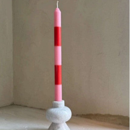Pigmalion London Set of 2 Dinner Candles in a pale pink and red stripe boxed in white packaging with 2 windows showing the colours of the candles