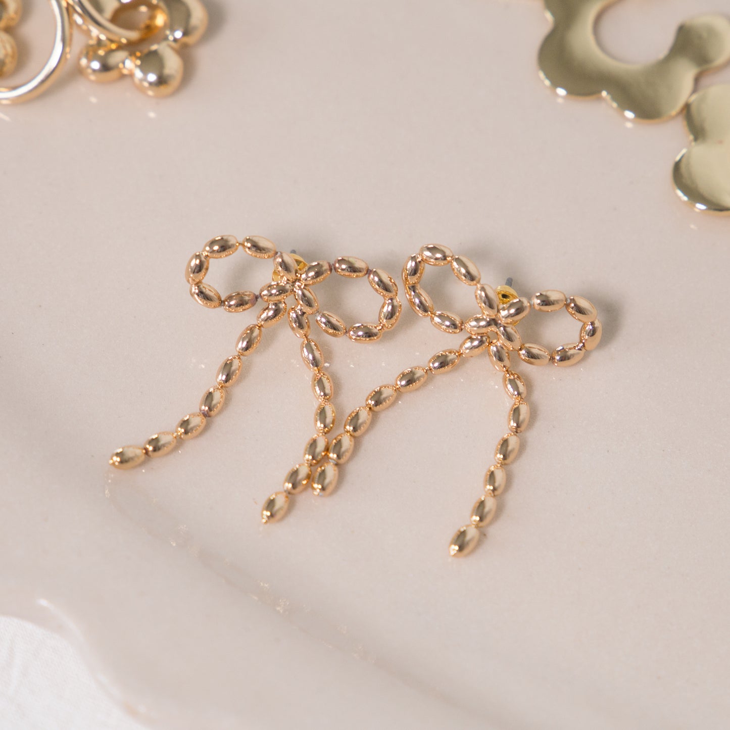 Celine Bow Dandle Stud Earrings in Silver or Gold Plated