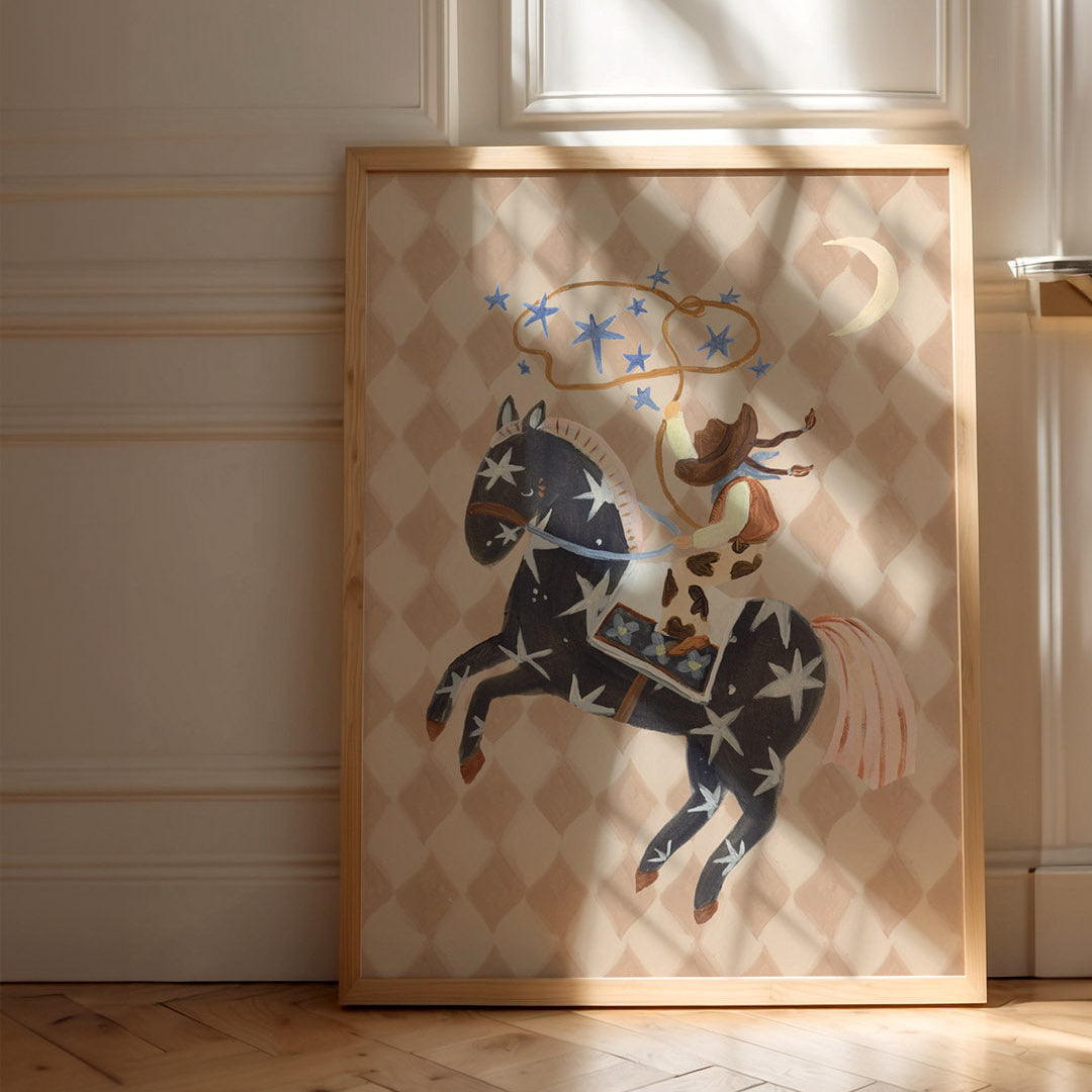 Framed artwork of a horse with star patterns on a wall.