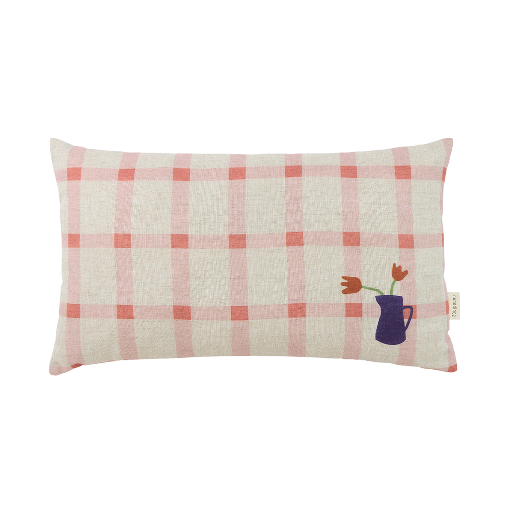 Pink Tulips Linen Cushion by Nobodinoz.  Checkered rectangle cushion with a blue vase in the corner which has 2 pink tulips in.
