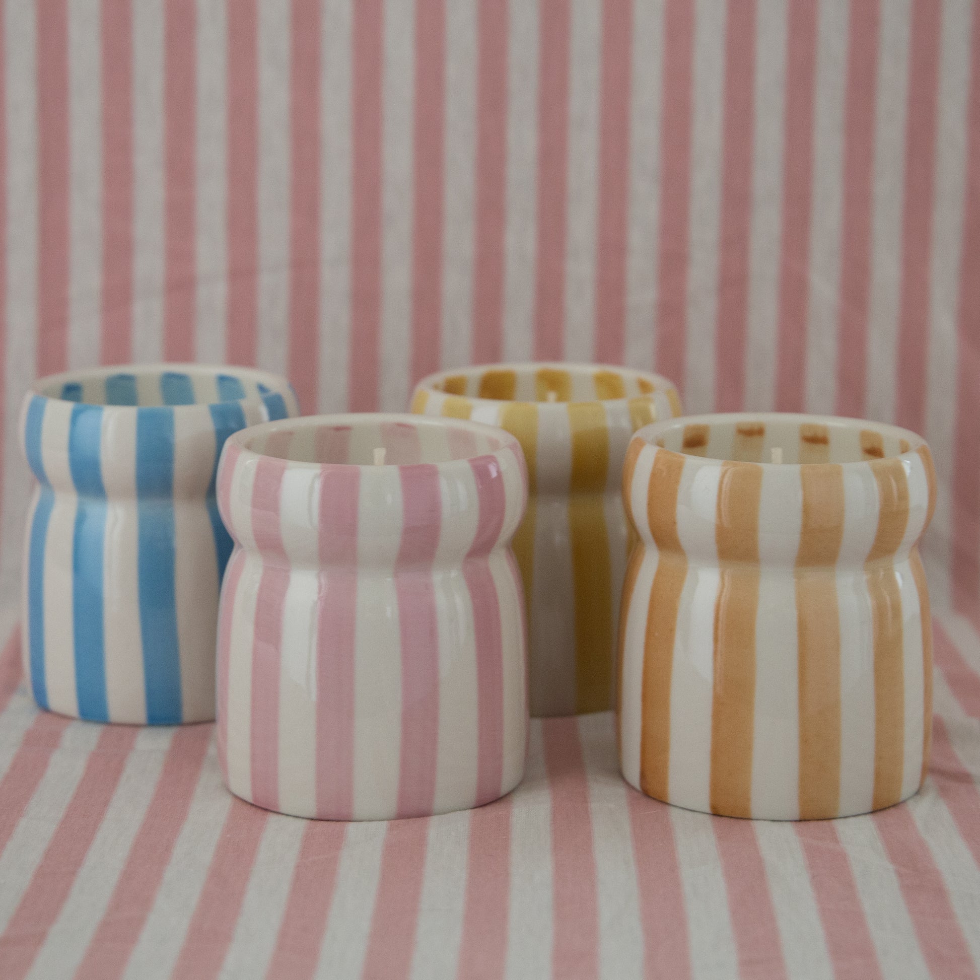 Striped ceramic handpainted scented candles in summer inspired scents