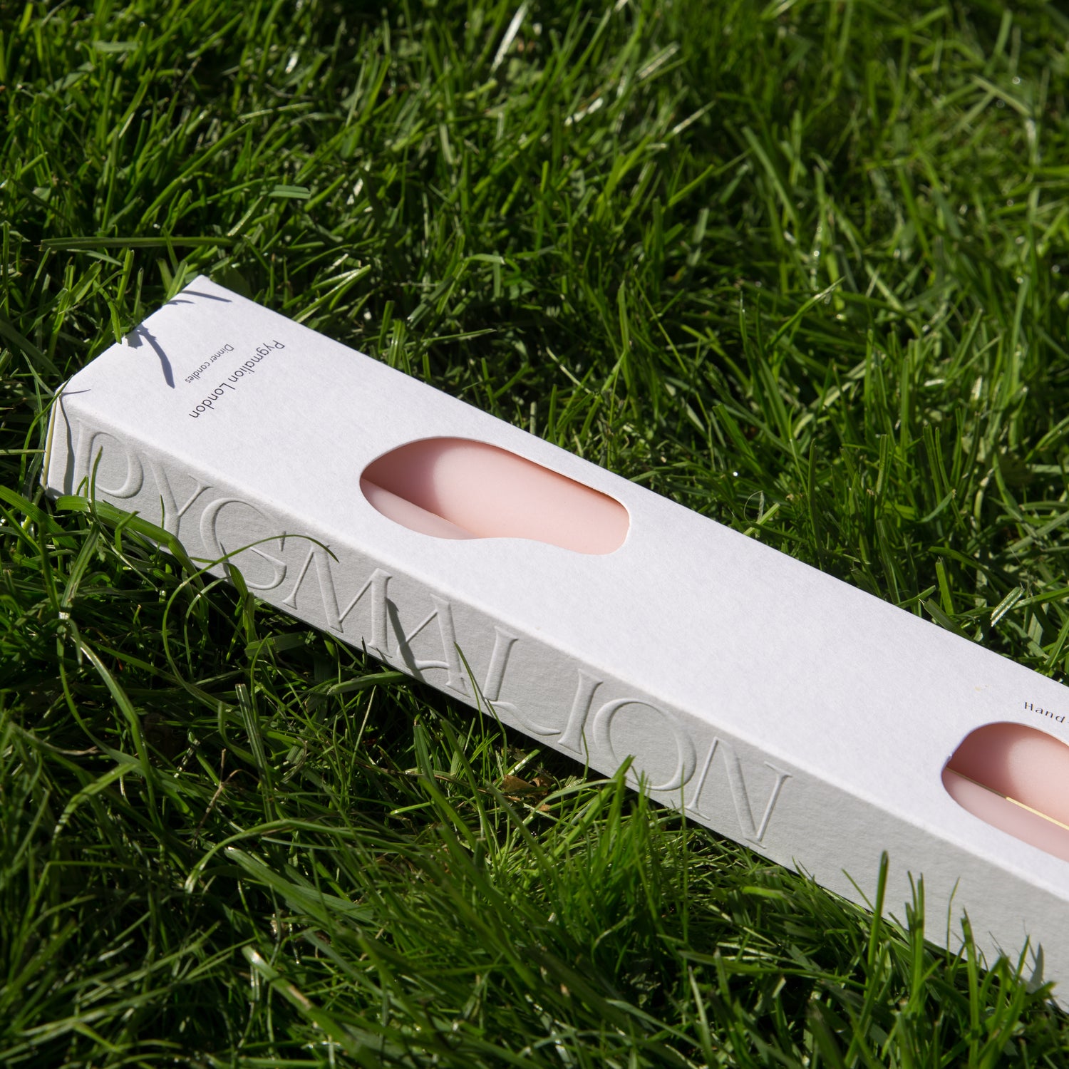 Pygmalion london dinner candles set of 2, close up of side of packaging 