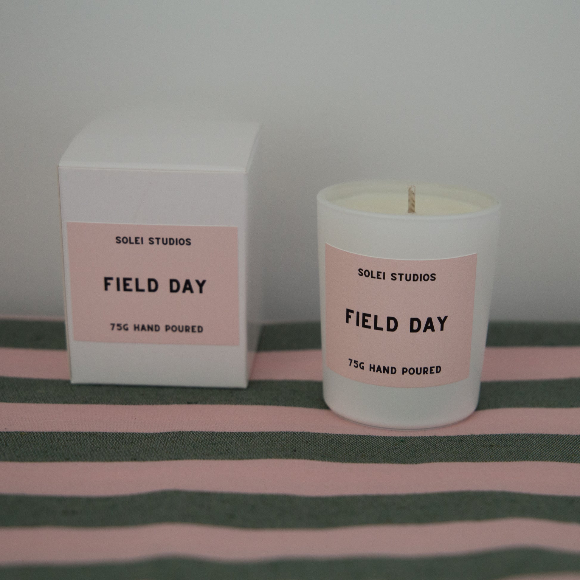 Solei Studios Field Day cut Grass scented candle front packaging display 