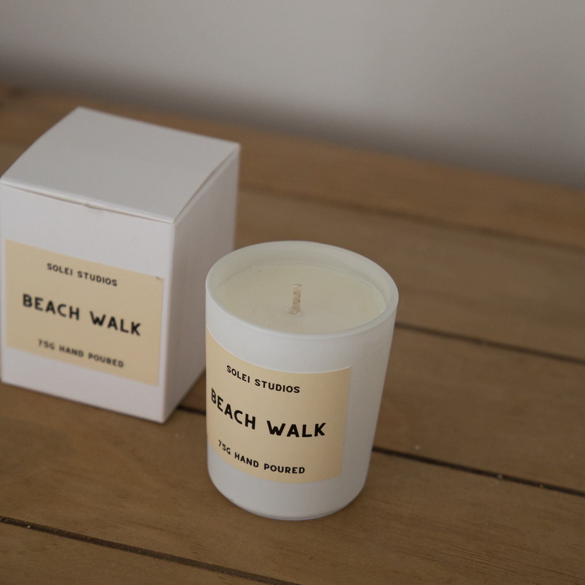 Solei Studios Mini Jar Candle Beach inspired front shot of packaging and candle displayed next to its box 