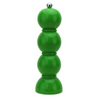 Green pepper grinder on a white background