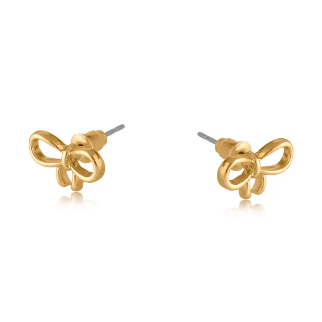Gold bow-shaped earrings on a white background