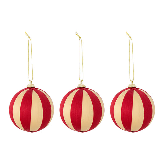 Three red and beige striped Christmas ornaments on a white background