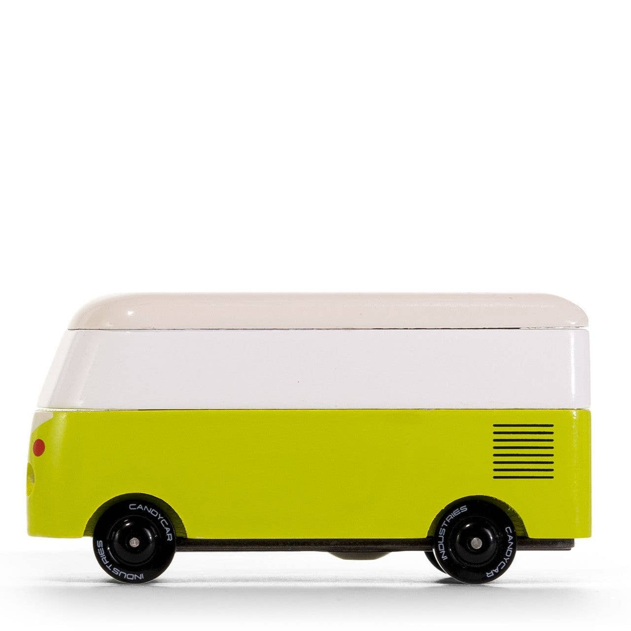 Small green and white vehicle model on a white background