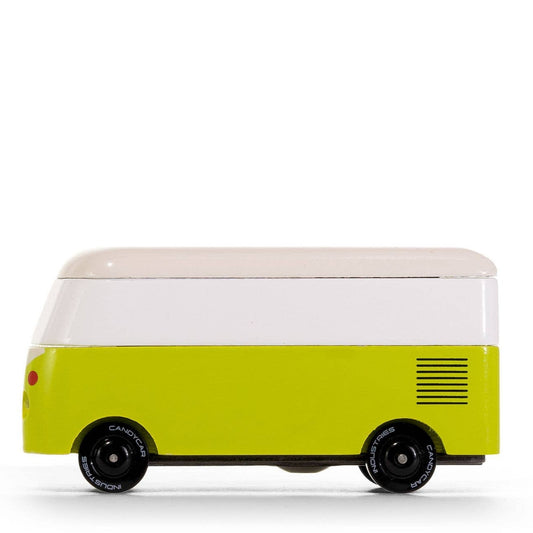 Small green and white vehicle model on a white background