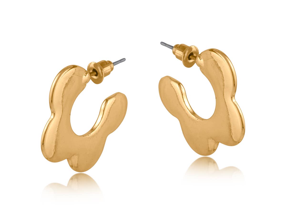 Gold hoop earrings on a white background