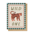 Greeting card with a tiger illustration and 'Wild One' text on a striped background