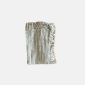 Striped ruffled hem linen table runner on a white background