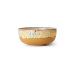Ceramic bowl with a speckled design on a white background