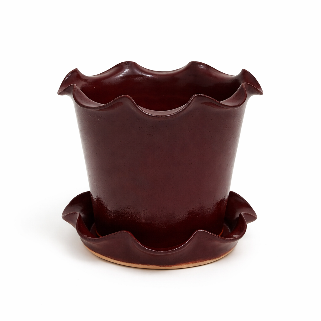 Cherry Red ceramic planter with ruffled edge on a white background