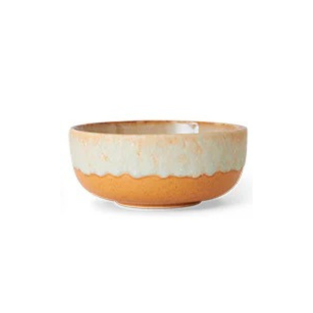Ceramic bowl with orange and beige gradient on a white background