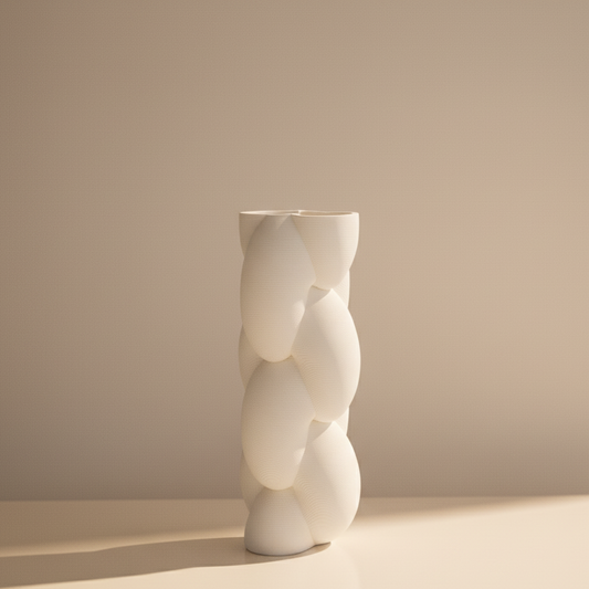 White abstract vase on a beige background