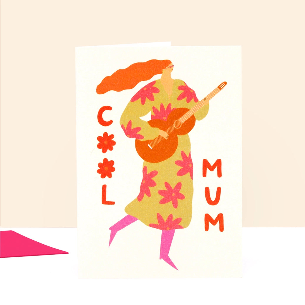 Illustration of a woman playing guitar with 'Cool Mum' text on a beige background