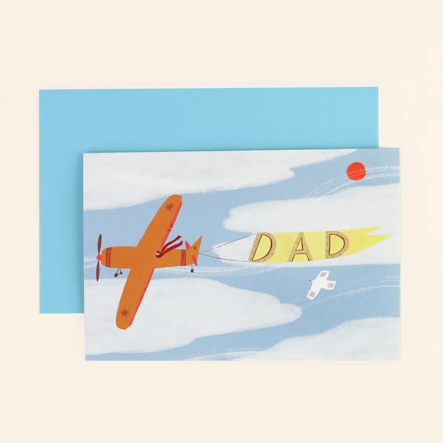 Greeting card with an airplane and 'DAD' banner on a blue background
