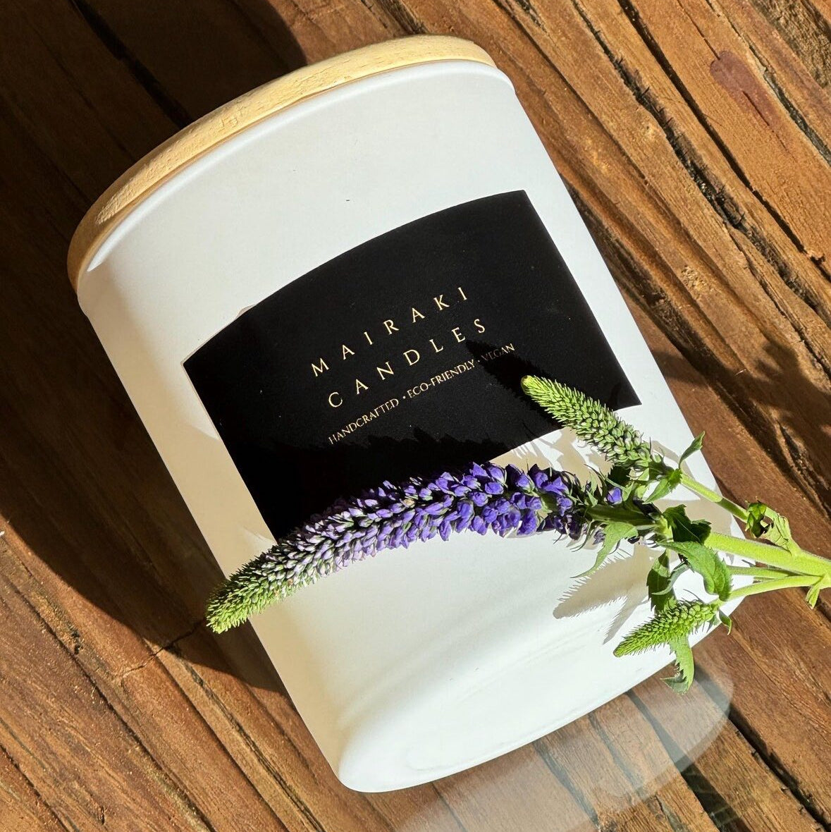 Scented white jar candle with lavender sprig