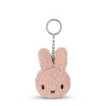 Pink bunny keychain on a white background