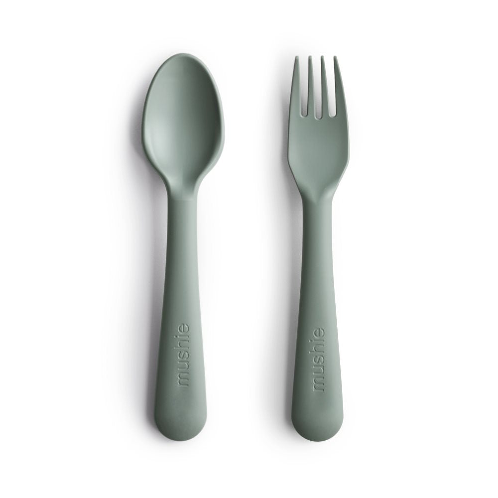 dried-thyme-fork-and-spoon-set-for-babies-on-a-white-background
