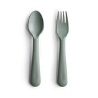 dried-thyme-fork-and-spoon-set-for-babies-on-a-white-background