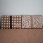 nobodinoz changing mats in two colourways made from organic cotton front display of both products
