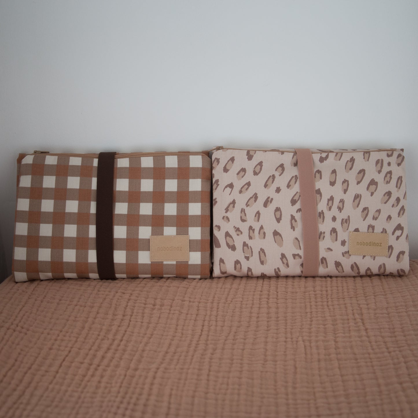 nobodinoz changing mats in two colourways made from organic cotton front display of both products
