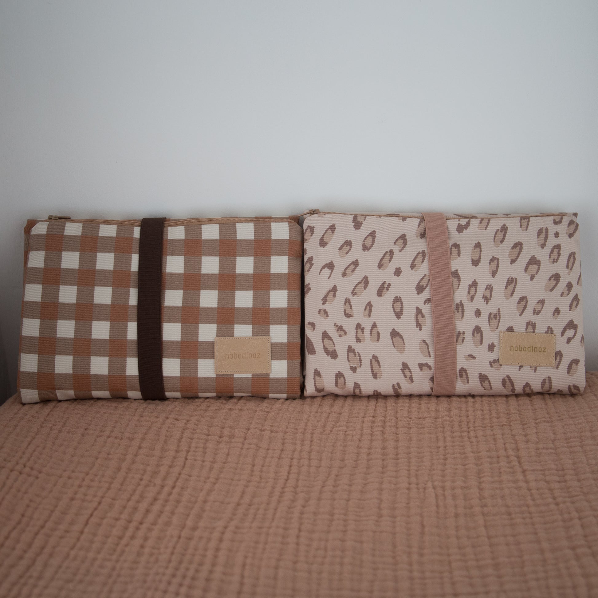 nobodinoz changing mats in two colourways made from organic cotton front display of both products