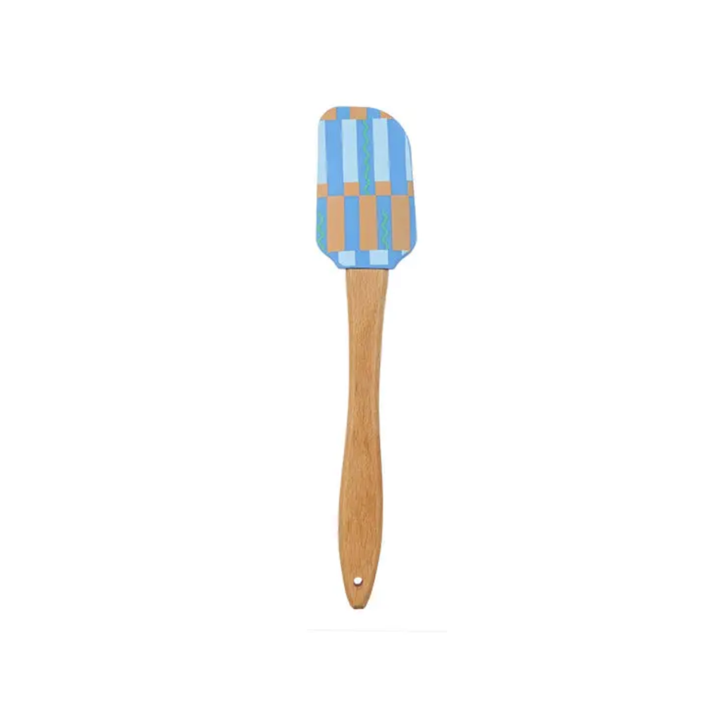 Spatula with a checkered blue and orange head and wooden handle on a white background
