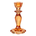 Amber glass candle holder on a white background