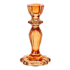 Amber glass candle holder on a white background
