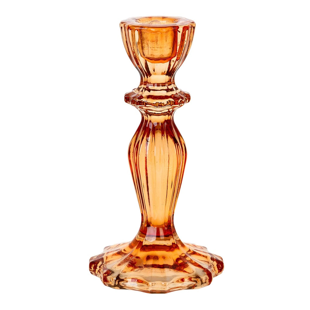 Amber glass candle holder on a white background