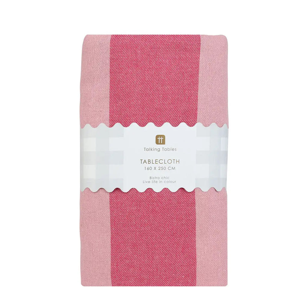 Pink tablecloth with a white label on a white background