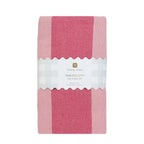 Pink tablecloth with a white label on a white background